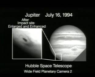 Hubble Space Telescope Image of Comet Shoemaker-Levy 9 Fragment A Impact  
(click to go to NASA description and enlargement)